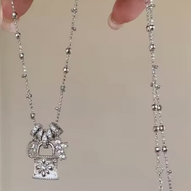 Κολιέ με λουκέτο και charms