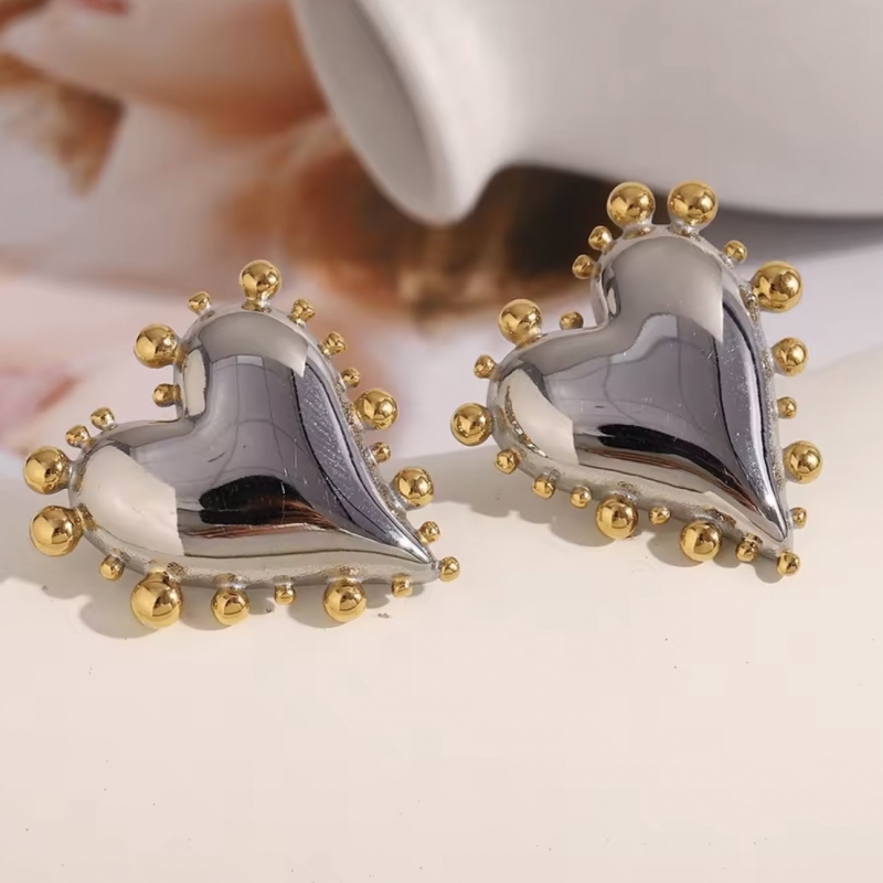 Σκουλαρίκια ατσάλι δίχρωμα καρδιές